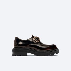 NWT. Uterque Black/Brown Glossy Finish Loafers. Size 6.